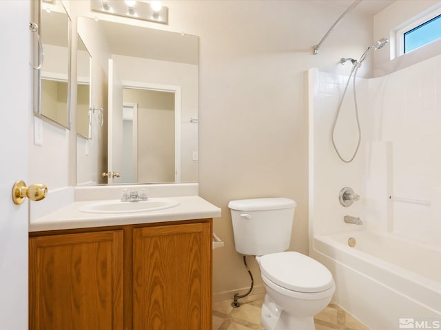 7433 Gannon Dr, Reno, NV 89506 - full bath featuring toilet, vanity, shower / bath combination, tile patterned flooring, and baseboards