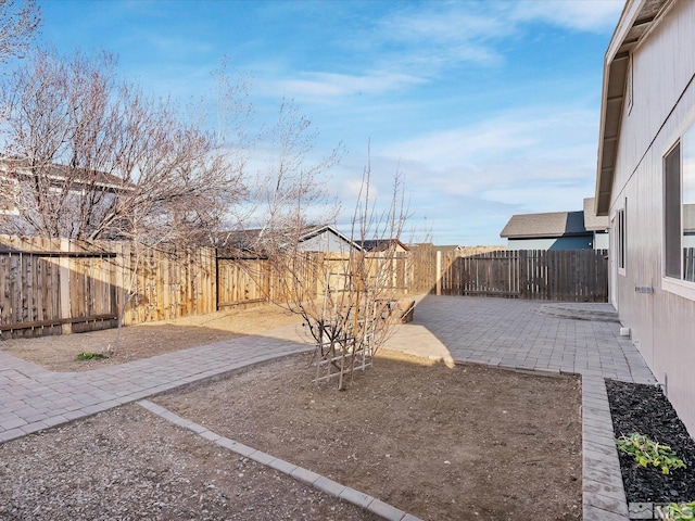 7433 Gannon Dr, Reno, NV 89506 - fenced backyard featuring a patio area