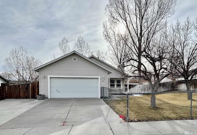 ranch-style home featuring driveway and a garage