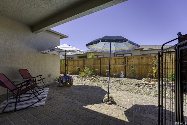 7317 Oakmont Ln, Sparks, NV 89436 - view of patio / terrace featuring fence