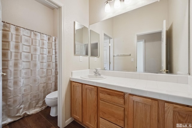 823 Gullane Ct, Dayton, NV 89403 - full bath with toilet, vanity, wood finished floors, and a shower with curtain