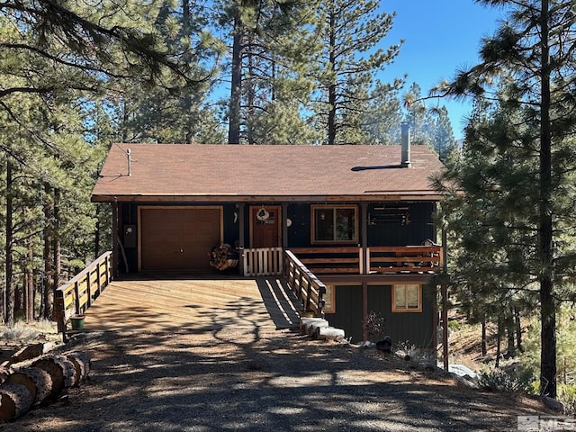 60 Lava Cap, Markleeville, CA 96120 - rustic home featuring driveway, a garage, and a shingled roof