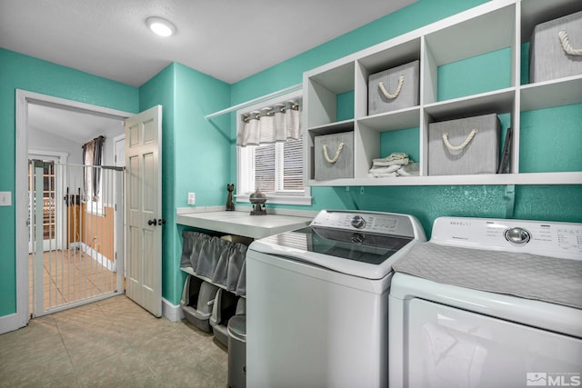 285 James Ave, Dayton, NV 89403 - laundry room with washer and dryer, baseboards, and tile patterned flooring