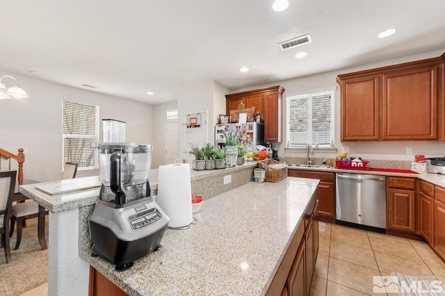 2020 Alamo Square Way, Reno, NV 89509 - kitchen featuring stainless steel dishwasher, a center island, a sink, recessed lighting, and light stone counters