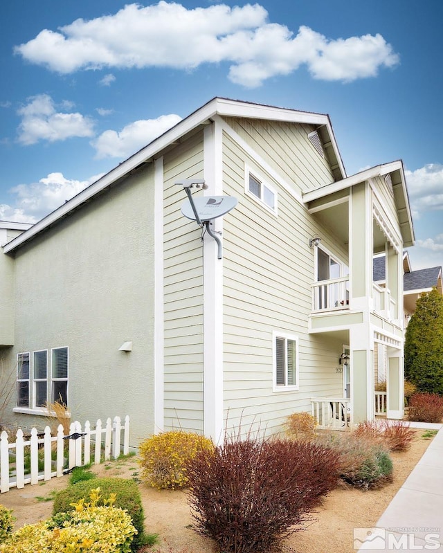 2020 Alamo Square Way, Reno, NV 89509 - view of side of property featuring fence and a balcony