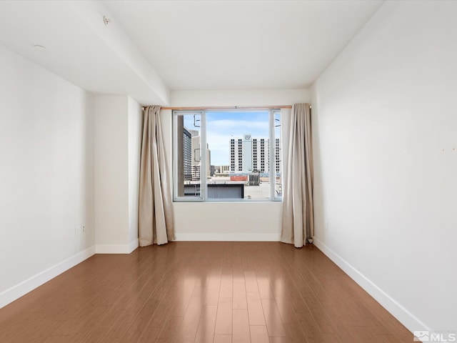 50 N Sierra Unit 605, Reno, NV 89501 - empty room with wood finished floors and baseboards