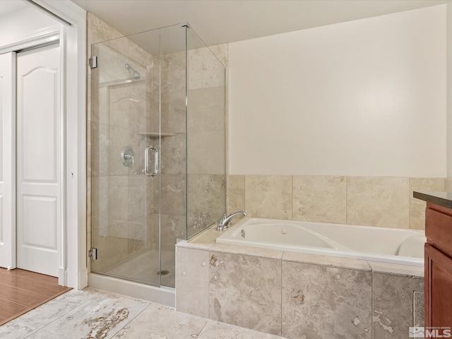 50 N Sierra Unit 605, Reno, NV 89501 - bathroom with a bath and a shower stall