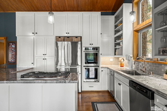 1005 Marlene St, Incline Village, NV 89451 - kitchen with stainless steel appliances, a sink, wood ceiling, light stone counters, and backsplash