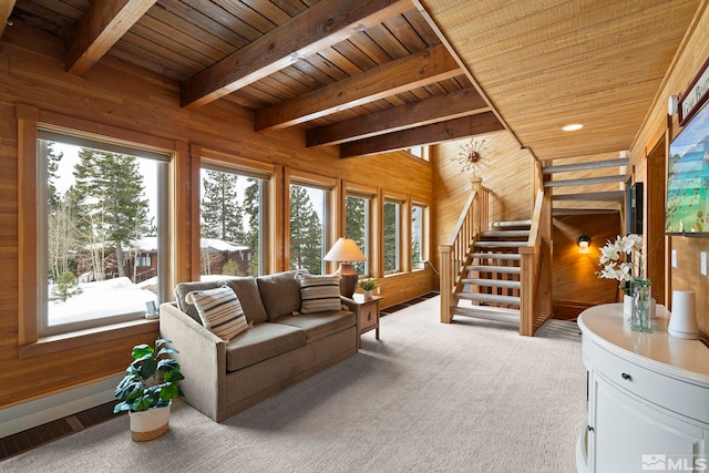 1005 Marlene St, Incline Village, NV 89451 - living area with wooden walls, wood ceiling, healthy amount of natural light, beam ceiling, and stairway