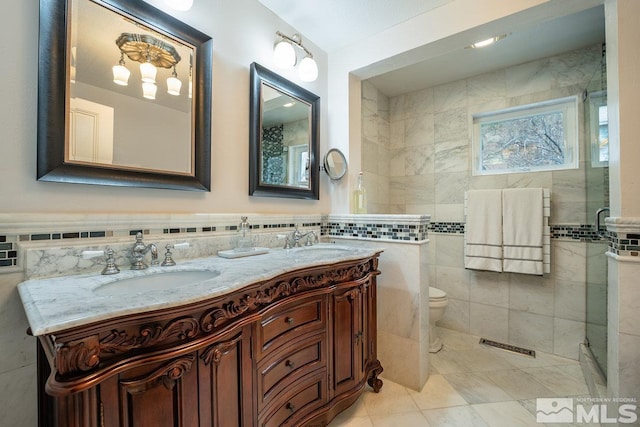 182 Mill St, Genoa, NV 89411 - full bath with tile walls, a stall shower, tile patterned floors, toilet, and double vanity