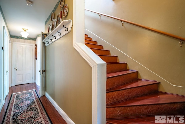 182 Mill St, Genoa, NV 89411 - stairs with wood finished floors and baseboards