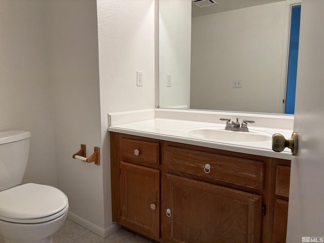1721 Burnside Dr, Sparks, NV 89434 - half bath with tile patterned flooring, toilet, and vanity