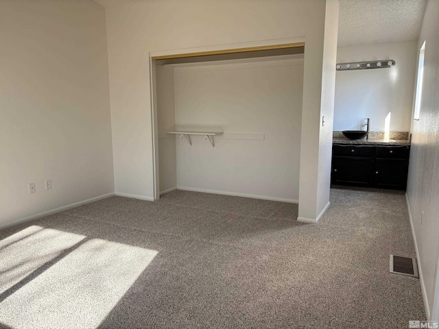 1721 Burnside Dr, Sparks, NV 89434 - unfurnished bedroom with a closet, carpet floors, and baseboards