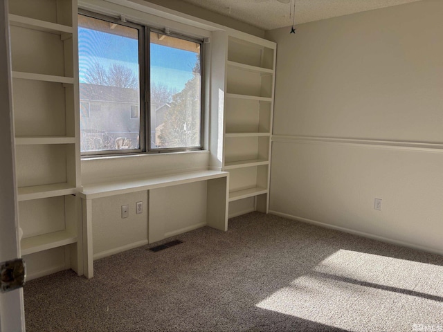 1721 Burnside Dr, Sparks, NV 89434 - unfurnished room with carpet flooring, a textured ceiling, baseboards, and a ceiling fan