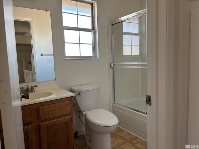 1721 Burnside Dr, Sparks, NV 89434 - bathroom with vanity, toilet, enclosed tub / shower combo, and tile patterned floors