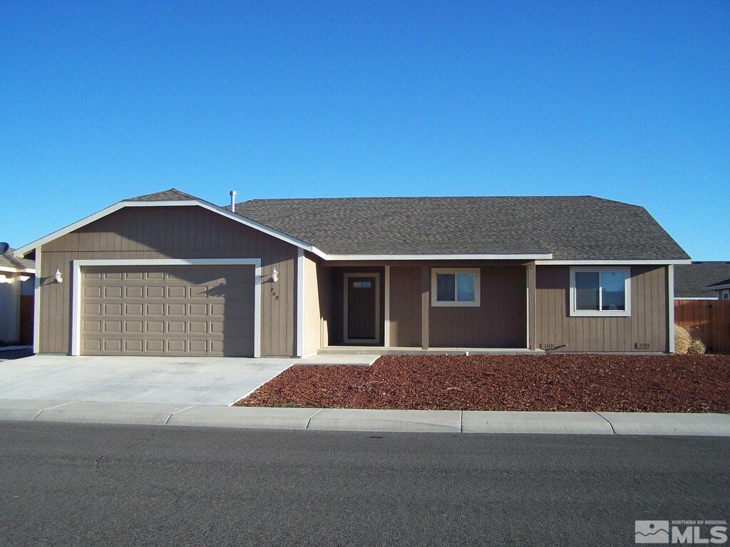 742 Megan Way, Fallon, NV 89406 - single story home with an attached garage, concrete driveway, and a shingled roof