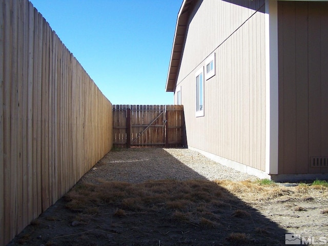 742 Megan Way, Fallon, NV 89406 - view of side of property featuring fence and a gate