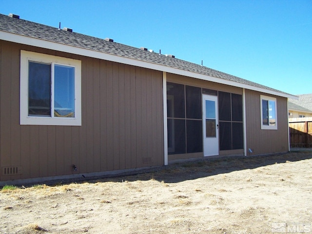 742 Megan Way, Fallon, NV 89406 - rear view of house with fence and a sunroom