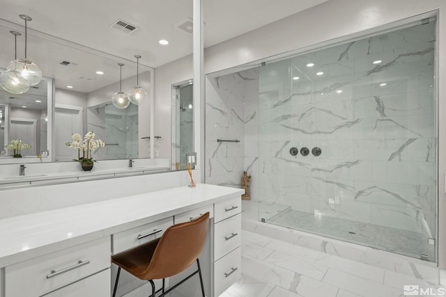 full bath featuring marble finish floors, a marble finish shower, vanity, and recessed lighting