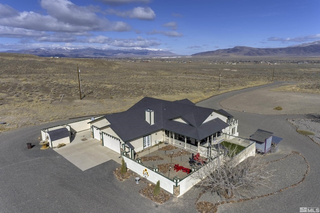 1875 View Ct, Fernley, NV 89408 - view from above of property featuring a mountain backdrop and a desert landscape