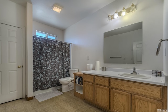 1875 View Ct, Fernley, NV 89408 - full bath with toilet, vanity, tile patterned floors, and a shower with shower curtain