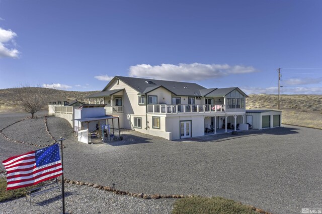 1875 View Ct, Fernley, NV 89408 - rear view of property featuring french doors and an outdoor structure