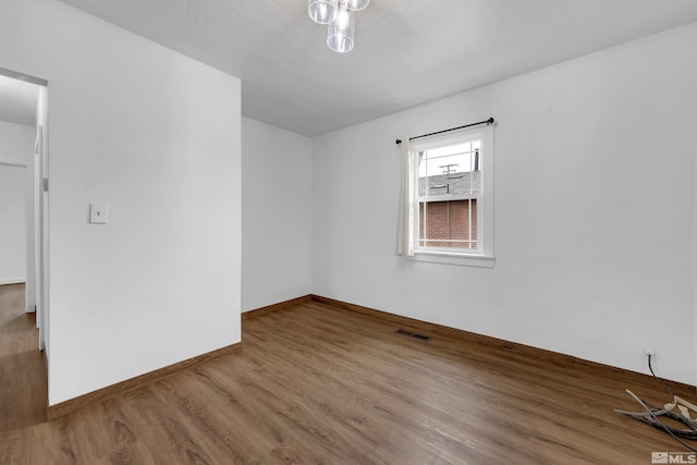 435 14th St, Sparks, NV 89431 - empty room featuring wood finished floors and baseboards