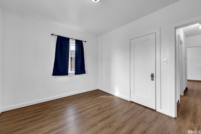 435 14th St, Sparks, NV 89431 - spare room featuring wood finished floors and baseboards