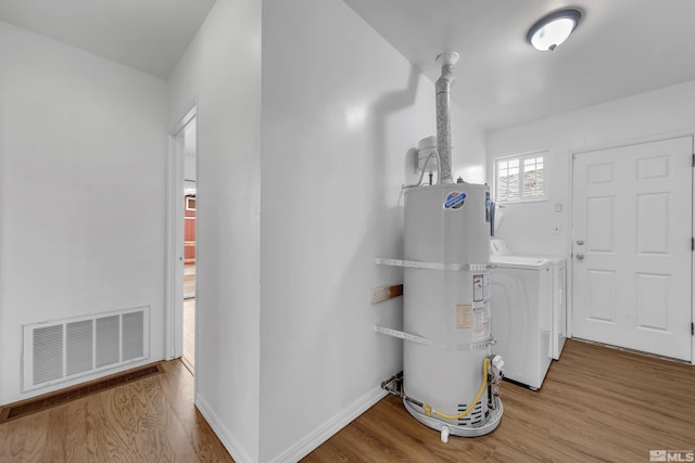435 14th St, Sparks, NV 89431 - utility room with water heater and washer and clothes dryer