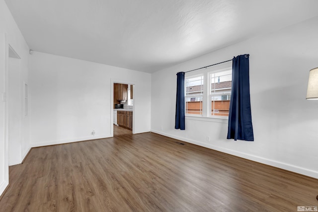 435 14th St, Sparks, NV 89431 - spare room featuring wood finished floors and baseboards