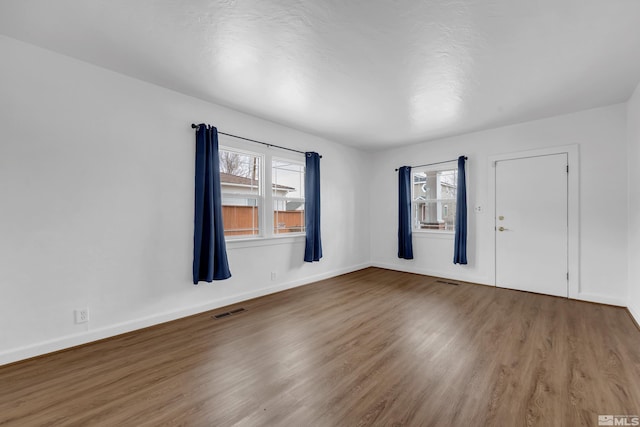 435 14th St, Sparks, NV 89431 - empty room featuring wood finished floors and baseboards