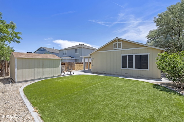 7721 Welsh Dr, Reno, NV 89506 - rear view of property featuring a patio and a shed