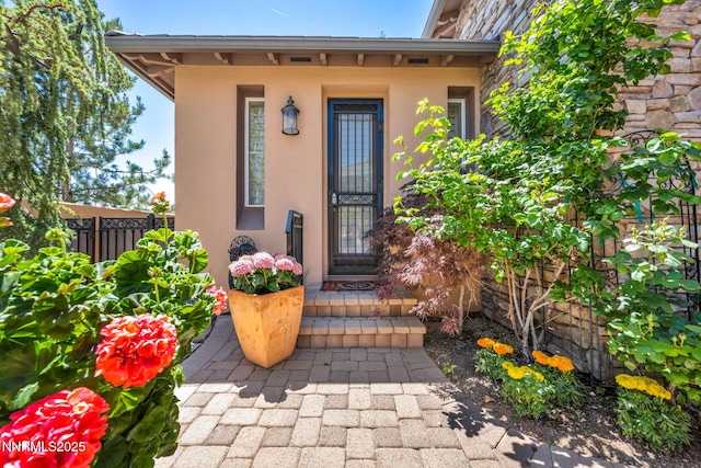 10100 Via Ponte, Reno, NV 89511 - doorway to property featuring stucco siding
