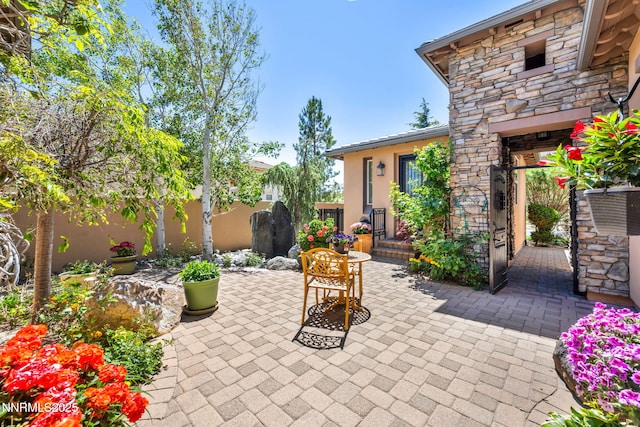 10100 Via Ponte, Reno, NV 89511 - fenced backyard featuring a patio