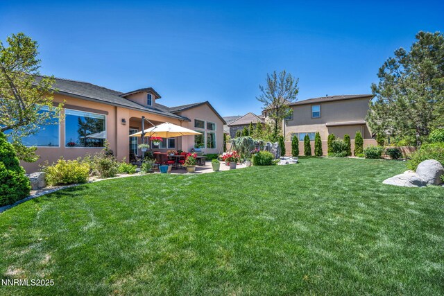 10100 Via Ponte, Reno, NV 89511 - view of yard featuring a patio