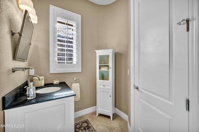 10100 Via Ponte, Reno, NV 89511 - bathroom with vanity and baseboards