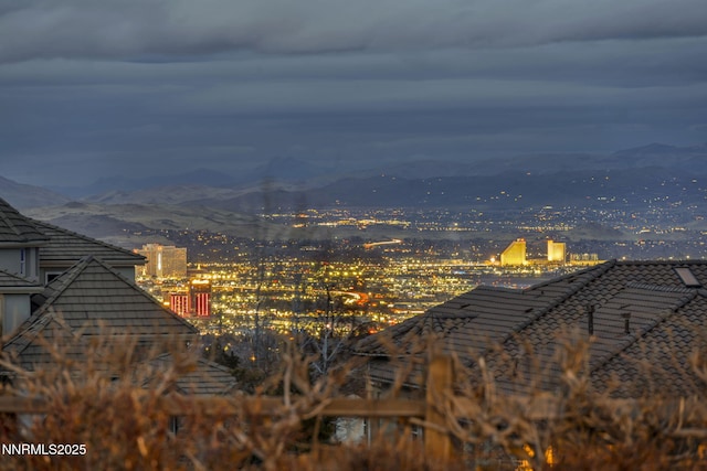 10100 Via Ponte, Reno, NV 89511 - city view with a mountain backdrop and a view of city lights