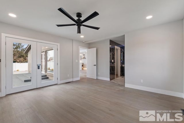 995 Skyline Blvd, Reno, NV 89509 - unfurnished bedroom featuring french doors, access to exterior, wood finished floors, baseboards, and recessed lighting