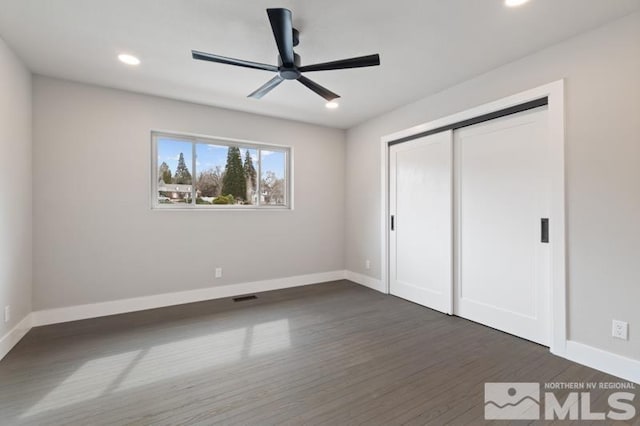 995 Skyline Blvd, Reno, NV 89509 - unfurnished bedroom featuring dark wood-style floors, baseboards, recessed lighting, a closet, and a ceiling fan
