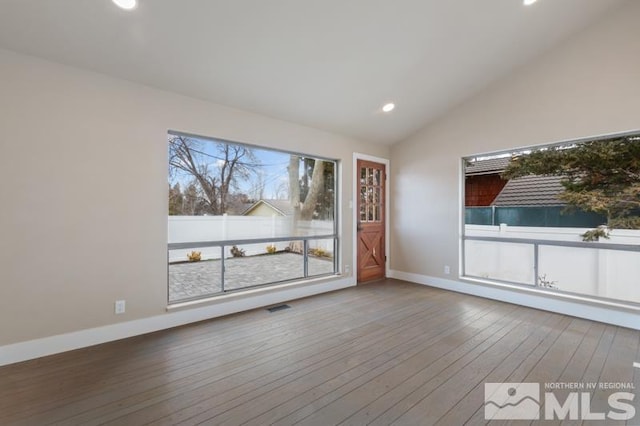 995 Skyline Blvd, Reno, NV 89509 - spare room featuring lofted ceiling, recessed lighting, hardwood / wood-style flooring, and baseboards
