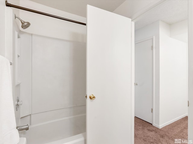 1465 E Peckham Ln Apt 55, Reno, NV 89502 - bathroom featuring washtub / shower combination and baseboards