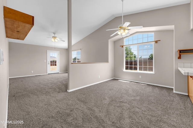 2172 Redhead Dr, Sparks, NV 89441 - unfurnished living room with a ceiling fan, carpet flooring, lofted ceiling, and baseboards