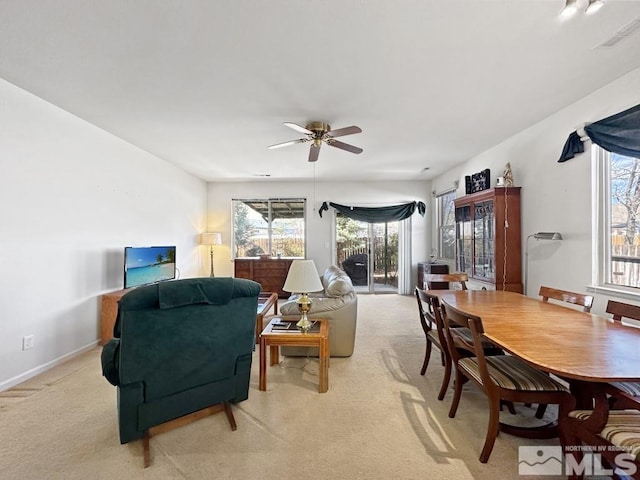 649 Rock Island Dr, Dayton, NV 89403 - dining area featuring a ceiling fan and light colored carpet