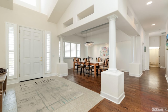 1659 Chiquita Ci, Minden, NV 89423 - foyer entrance featuring wood finished floors, decorative columns, recessed lighting, and baseboards