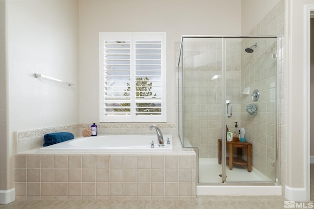 1659 Chiquita Ci, Minden, NV 89423 - bathroom featuring a stall shower, a garden tub, and tile patterned floors