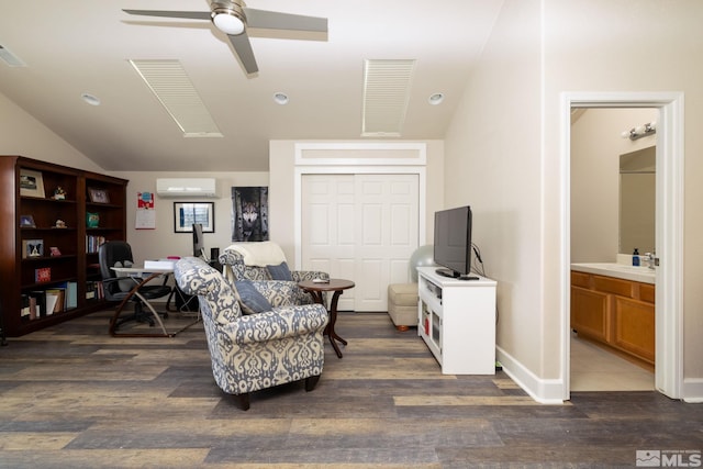 1659 Chiquita Ci, Minden, NV 89423 - living area featuring a ceiling fan, vaulted ceiling, a wall unit AC, wood finished floors, and an office area
