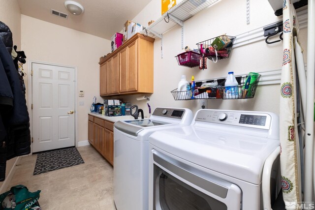 1659 Chiquita Ci, Minden, NV 89423 - laundry room featuring washer and clothes dryer and cabinet space