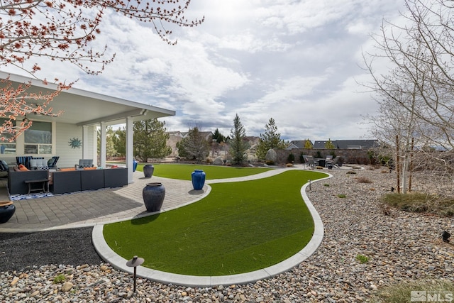 1659 Chiquita Ci, Minden, NV 89423 - view of home's community with an outdoor hangout area, a patio area, and a lawn