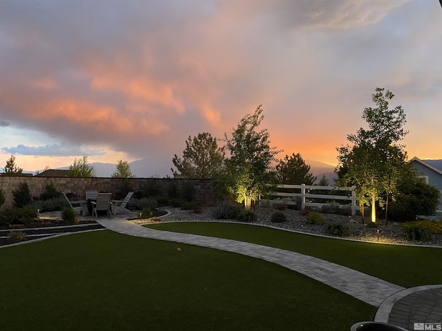 1659 Chiquita Ci, Minden, NV 89423 - yard at dusk featuring a patio area
