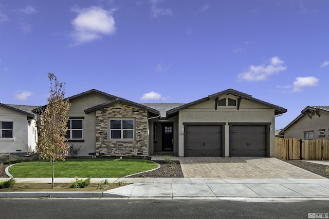 1791 La Cita, Minden, NV 89423 - single story home with decorative driveway, stucco siding, a garage, and stone siding